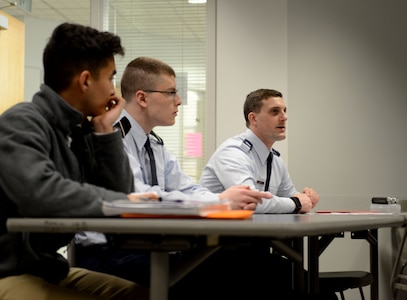 William Bryce Carpenter, University of Anchorage Alaska ROTC cadet, briefs his classmates on his experience shadowing Air Force 1st Lt. Jonathan Quinlan, assistant officer in charge of the 525th Aircraft Maintenance Unit, in Anchorage, March 10, 2017. The UAA ROTC cadets shadowed different Joint Base Elmendorf-Richardson officers to get a better understanding of what that officer's job is. 