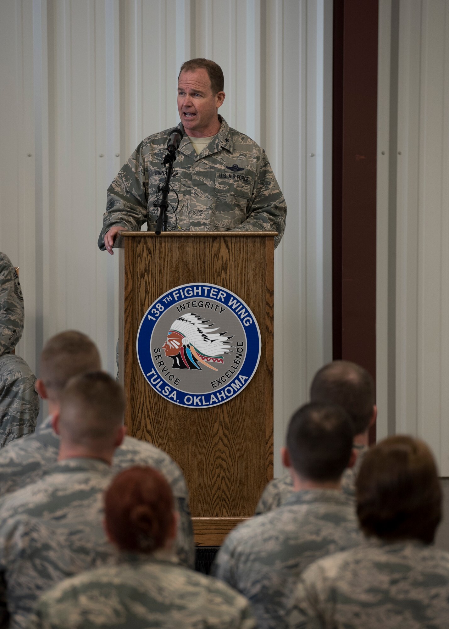 Brigadier General David Burgy, Chief of Staff of the Oklahoma Air National Guard speaks during a homecoming ceremony at the 138th Fighter Wing in Tulsa, Okla., March 5, 2017. More than 90 Airmen deployed from 12 squadrons across the 138th FW. (U.S. Air National Guard photo by Senior Airman Rebecca Imwalle)