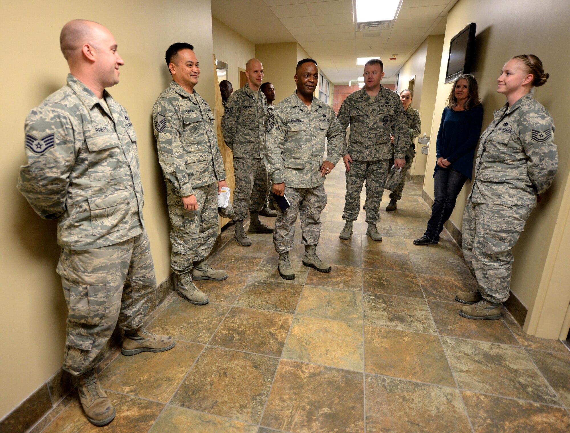 Chief Master Sgt. Calvin Williams, Air Force Global Strike Command command chief, center, meets with Airmen assigned to the 28th Logistics Readiness Squadron during a visit to Ellsworth Air Force Base, S.D., March 2, 2017. The 28th LRS Airmen showed Williams around the base’s deployment center while briefing about the deployment process at Ellsworth. (U.S. Air Force photo by Airman 1st Class Denise M. Jenson)