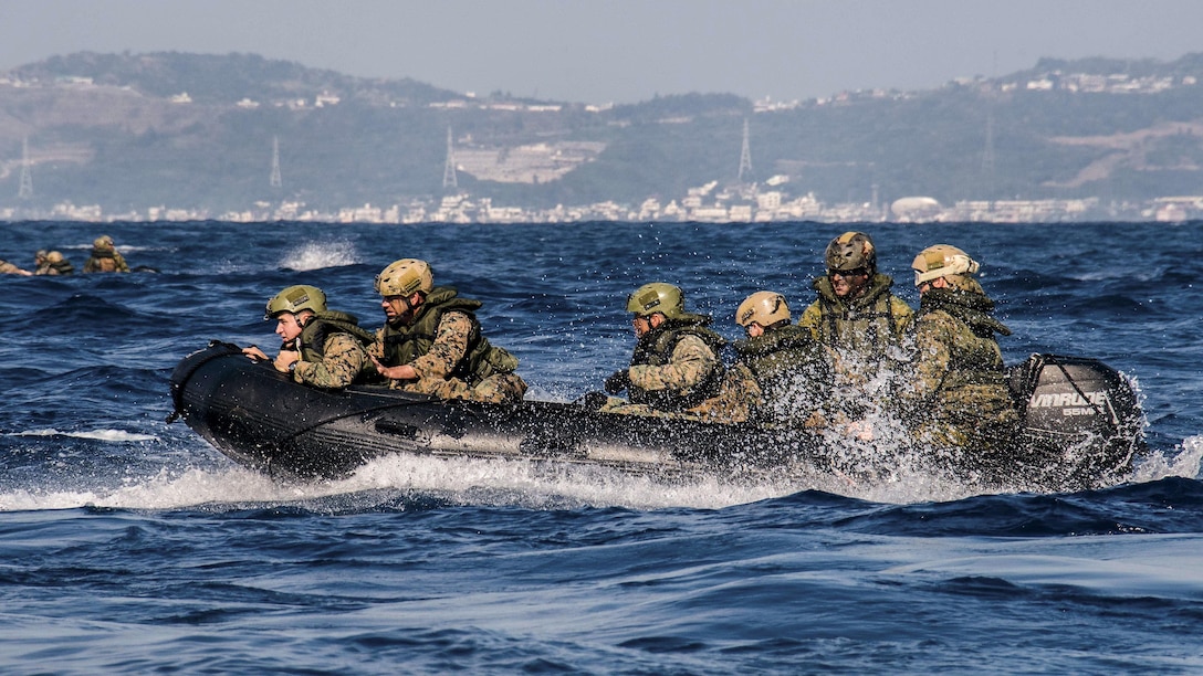 Marines disembark from the amphibious transport dock ship USS Green Bay during a combat rubber raiding craft beach raid off Okinawa, Japan, March 12, 2017. The Marines are assigned to the 31st Marine Expeditionary Unit. The Green Bay is operating in the Indo-Asia-Pacific region to enhance warfighting readiness. Navy photo by Petty Officer 1st Class Chris Williamson