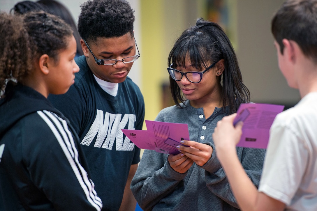 Teenagers participate in a scenario-based training called “In Their Shoes,” at Travis Air Force Base, Calif., Feb 16, 2017. Participants dating and the consequences of unhealthy relationships during the seminar. Air Force photo by Louis Briscese