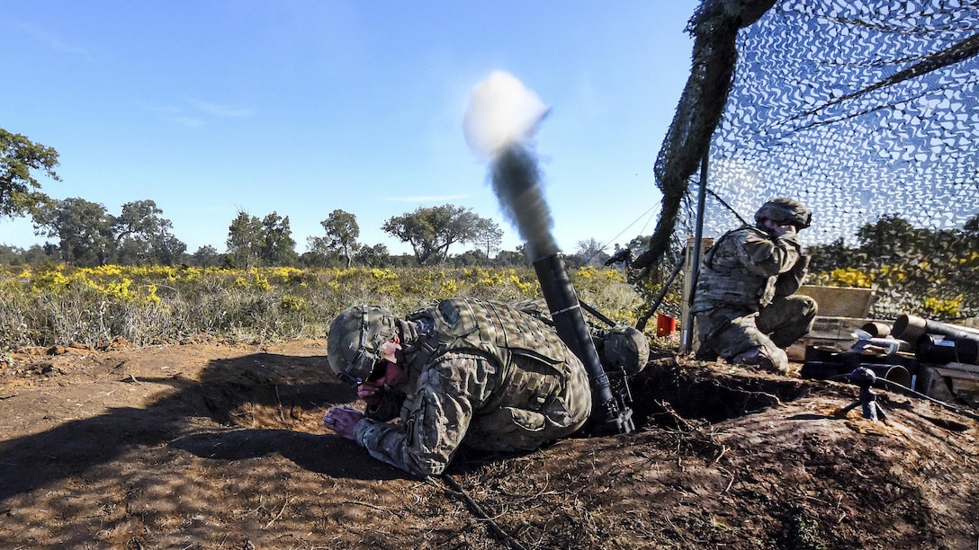 Soldiers fire a 120 mm mortar during Real Thaw, an exercise to develop international cooperation in air and land tactical training, in Santa Margarida, Portugal, March 10, 2017. Army photo by Staff Sgt. Philip Steiner 