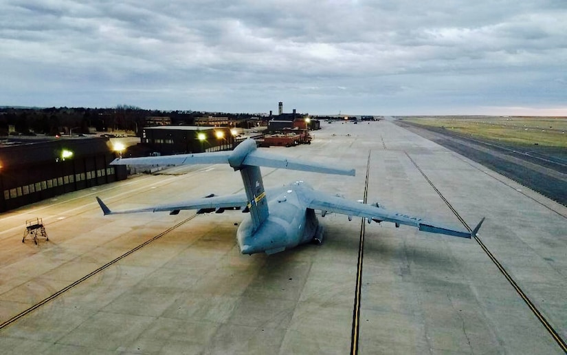 After flying from Joint Base Charleston, South Carolina to participate in an Off-Station trainer visit to the U.S. Air Force Academy, a 14th Airlift Squadron C-17  is parked on the ramp of Peterson Air Force Base, Colorado, Feb. 11, 2017.