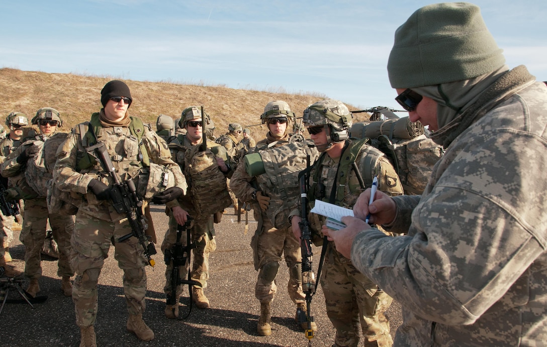 Army Soldiers assigned to the 101st Airborne Division (Air Assault), prepare to load an Army Reserve UH-60 Black Hawk Helicopter from 8th Battalion, 229th Aviation Regiment, based out of Fort Knox, Ky., at Lakehurst Maxfield Field during a multi-component airfield seizure training exercise between the Army Reserve and the 101st Airborne Division on March 13, 2017 to kick off Warrior Exercise 78-17-01. Several Army Reserve organizations including the Army Reserve Aviation Command, 84th Training Command, 78th Training Division, and members of the 200th Military Police Command helped Easy Company, 2nd Battalion, 506th Parachute Infantry Regiment, 101st Airborne Division conduct the mission. Roughly 60 units from the U.S. Army Reserve, U.S. Army, U.S. Air Force, and Canadian Armed Forces are participating in the 84th Training Command’s joint training exercise, WAREX 78-17-01, at Joint Base McGuire-Dix-Lakehurst from March 8 until April 1, 2017; the WAREX is a large-scale collective training event designed to assess units’ combat capabilities as America’s Army Reserve continues to build the most capable, combat-ready, and lethal Federal Reserve force in the history of the Nation.