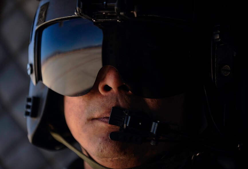 A Singapore air force crew chief prepares for a combat search and rescue mission over the Nevada Test and Training Range, during Red Flag 17-2, March 6. 2017. Along with exposing their crew to new allies, Red Flag has served to place the Singapore air force into new exercise conditions. (U.S. Air Force photo by Airman 1st Class Kevin Tanenbaum/Released)