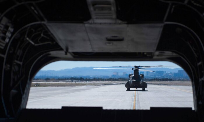 A Singapore air force CH-47 Chinook taxis down the flightline at Nellis Air Force Base, Nev., before a combat search and rescue mission during Red Flag 17-2, March 6, 2017. Red Flag has exposed the Singapore air force to new variables, and it also granted new pilots with leadership experience. (U.S. Air Force photo by Airman 1st Class Kevin Tanenbaum/Released)