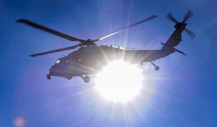 A Navy UH-60 Blackhawk flies after recovering a simulated injured pilot during a Red Flag 17-2 combat search and rescue mission on the Nevada Test and Training Range, March 8, 2017. Search and rescue operations during Red Flag improve efficiency and readiness for future real-world operations. (U.S. Air Force photo by Airman 1st Class Kevin Tanenbaum/Released)