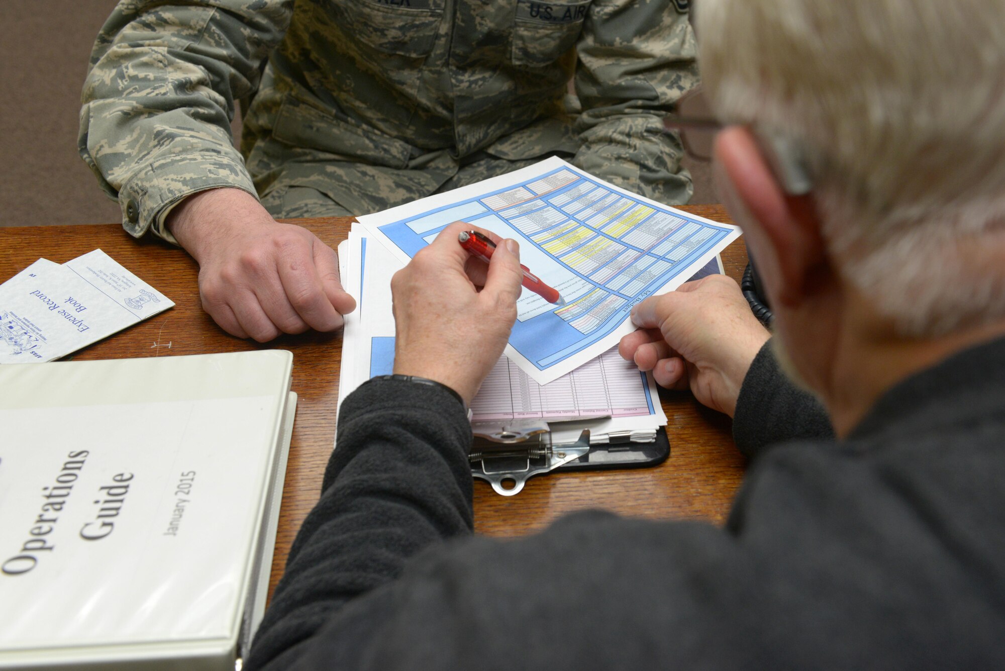 Michael Baty, 673d Force Support Squadron community readiness specialist, explains an Airman’s budget before being able to apply for an Air Force Aid Society loan at the Military and Family Readiness Center at Joint Base Elmendorf-Richardson, Alaska, March 14, 2017. The Air Force Aid Society is the official charity of the U.S. Air Force and fulfills the needs of Airmen and their families through emergency financial assistance, educational support, and community programs since 1942. 