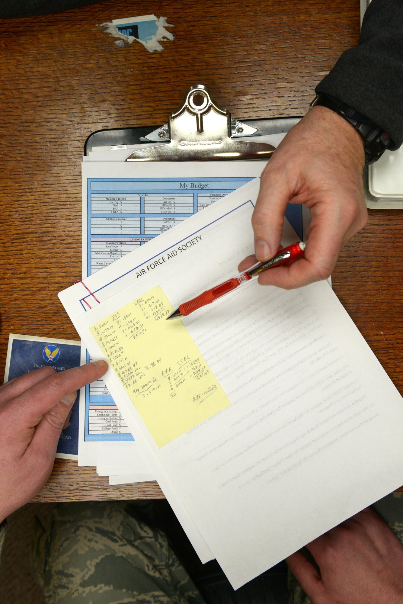 Michael Baty, 673d Force Support Squadron community readiness specialist, explains the distribution of funds from the Air Force Aid Society to a few programs on Joint Base Elmendorf-Richardson, such as the Child Care, Car Care, and Spouse Employment, at the Military and Family Readiness Center at JEBR, Alaska, March 14, 2017. The Air Force Aid Society is the official charity of the U.S. Air Force and fulfills the needs of Airmen and their families through emergency financial assistance, educational support, and community programs since 1942. 
