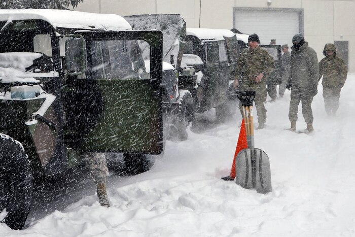 New York Army National Guard soldiers prepare their Humvees for missions in Latham, N.Y., as a massive snowstorm hits the region, March 14, 2017. Army National Guard photo by Sgt. Maj. Corine Lombardo