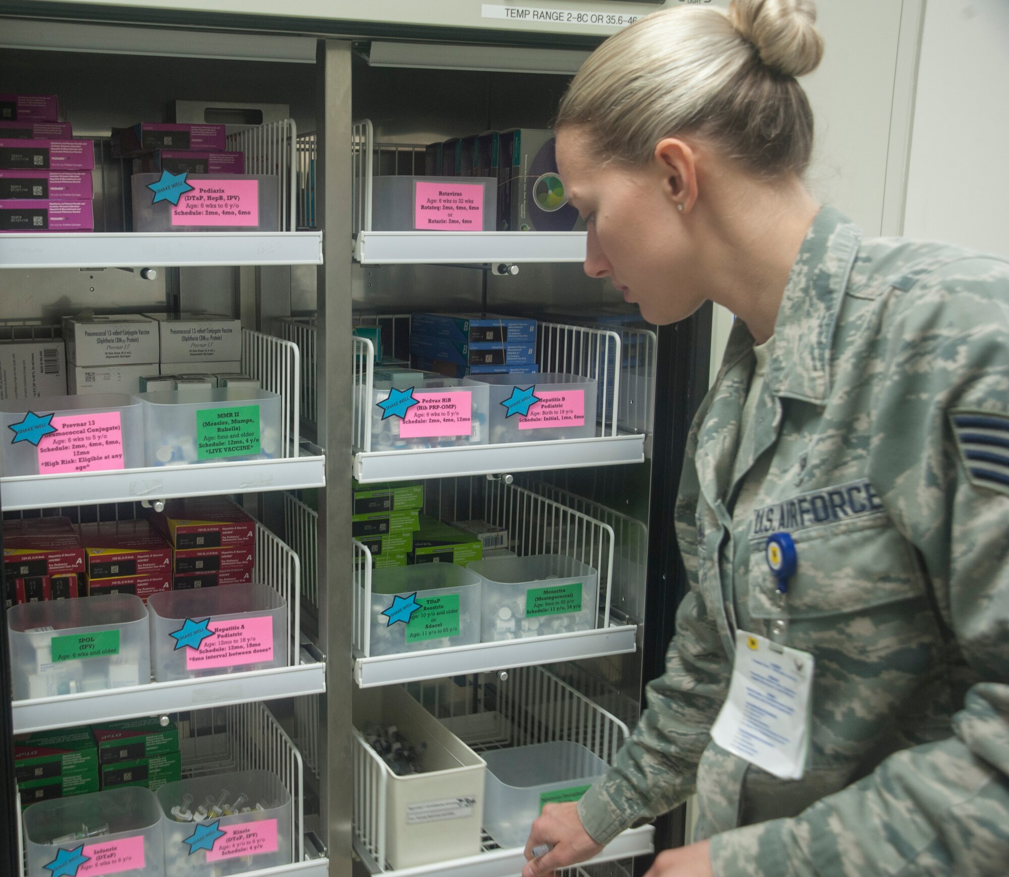 U.S. Air Force Staff Sgt. Maura Turjillo, 18th Medical Group allergy and immunizations technician, gathers a patient’s vaccines March 14, 2017 at Kadena Air Base, Japan. Whether maintaining an up-to-date flu vaccine or preparing for a temporary duty, the 18th Medical Group has the resources to keep Airmen ready and healthy. (U.S. Air Force photo by Airman 1st Class Quay Drawdy)