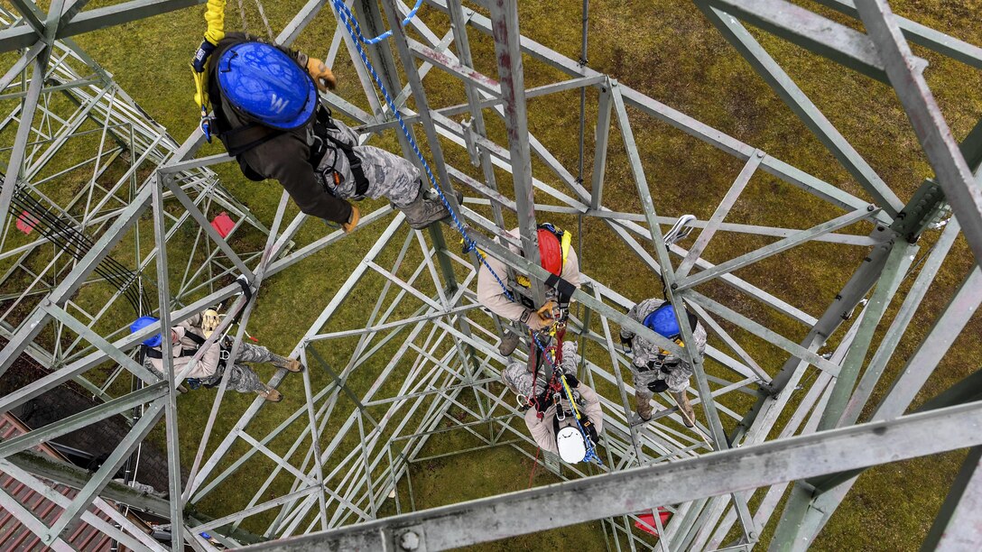 Airmen participate in tower rescue and climbing training at Ramstein Air Base, Germany, March 9, 2017. The airmen are assigned to the 1st Communications Maintenance Squadron. Air Force photo by Senior Airman Tryphena Mayhugh