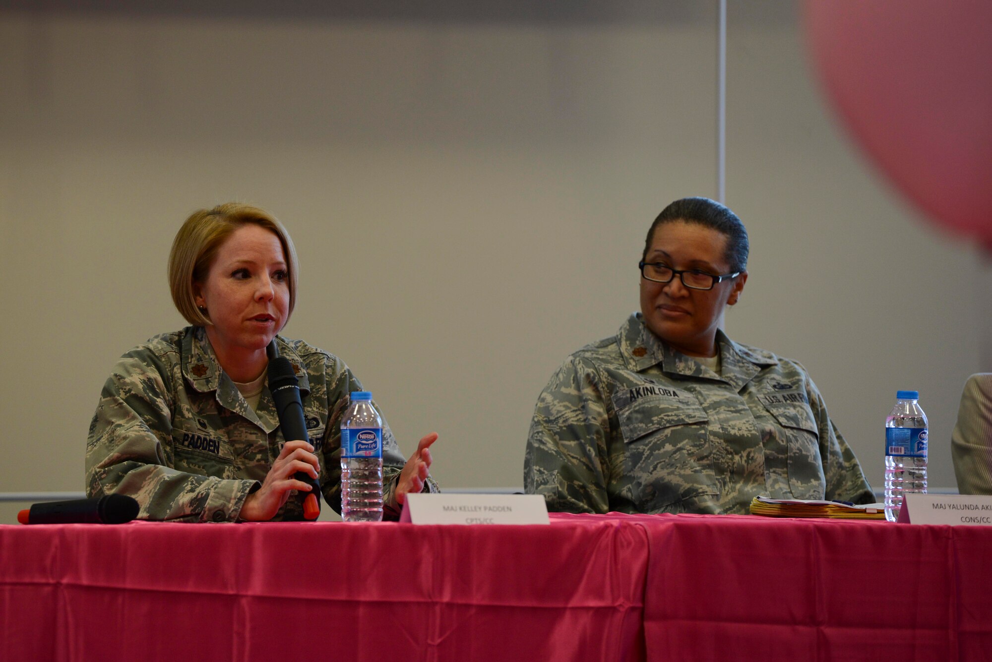 U.S. Air Force Maj. Kelly Padden (left), 39th Comptroller Squadron commander, and Maj. Yalunda Akinloba, 39th Contracting Squadron commander, speak at Incirlik’s International Women’s Day lunch and learn event March 8, 2017, at Incirlik Air Base, Turkey. Padden and Akinloba answered questions about how they overcame adversity in their careers. (U.S. Air Force photo by Airman 1st Class Devin M. Rumbaugh)