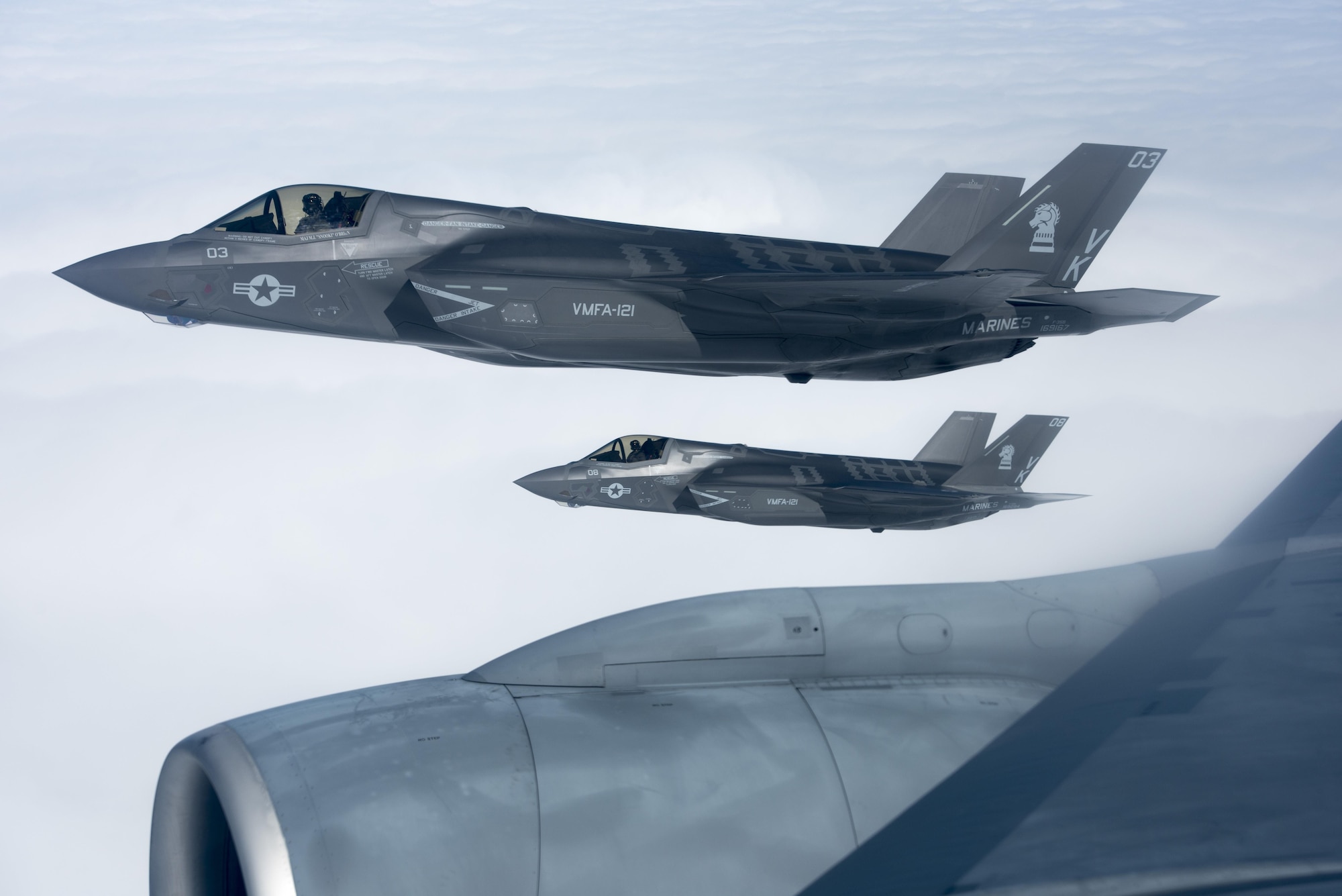 U.S. Marine Corps F-35B Lightning IIs from Marine Fighter Attack Squadron 121, fly in formation with a KC-135 Stratotanker from the 909th Air Refueling Squadron March 14, 2017, over the Pacific Ocean. The two units conducted aerial refueling for the first time within the 909th’s area of operation. (U.S. Air Force photo by Senior Airman John Linzmeier)