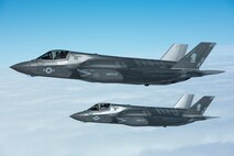 U.S. Marine Corps F-35B Lightning IIs from Marine Fighter Attack Squadron 121 fly in formation next to a U.S. Air Force KC-135 Stratotanker from the 909th Air Refueling Squadron March 14, 2017, over Pacific waters. The F-35B is a fifth-generation fighter, which is the world’s first operational supersonic short takeoff and vertical landing aircraft. (U.S. Air Force photo by Senior Airman John Linzmeier)