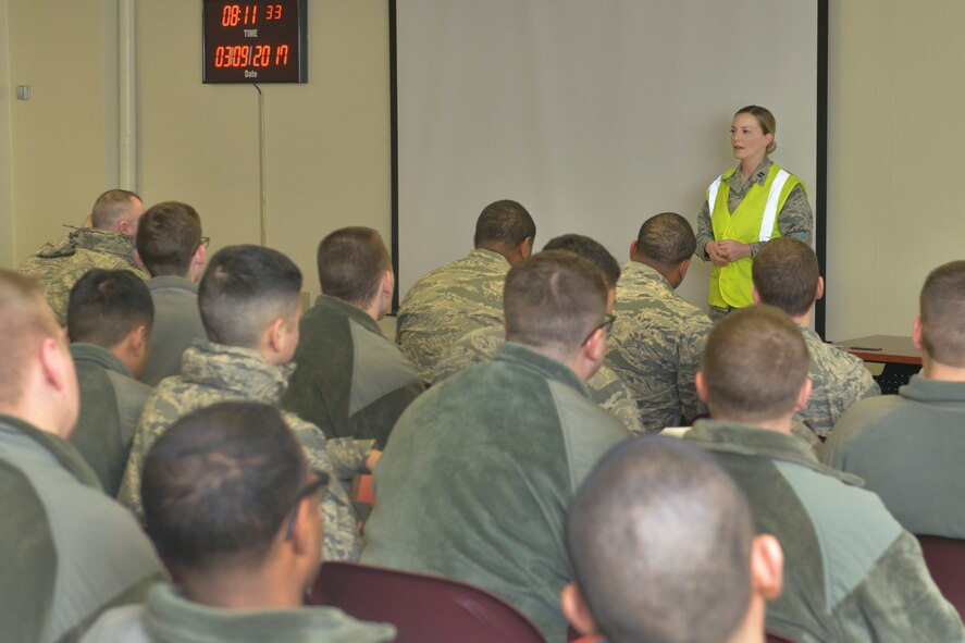 Capt. Marilyn Smith, 5th Force Support Squadron manpower and personnel flight commander, speaks with Airmen before deployment out-processing March 9, 2017. More than 400 Airmen from the 5th Bomb Wing recently deployed to the Middle East, in support of U.S. Central Command’s Operation Inherent Resolve. (U.S. Air Force photo/Airman 1st Class Jessica Weissman)