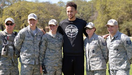 Kyle Anderson of the San Antonio Spurs poses with basic officer leadership course cadre at Joint Base San Antonio-Camp Bullis March 14.