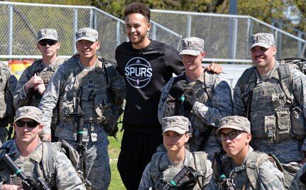 Kyle Anderson of the San Antonio Spurs poses with basic officer leadership course cadre at Joint Base San Antonio-Camp Bullis March 14. 