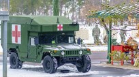 A medical vehicle stands ready as U.S. Army Reserve Soldiers zero with the M240B machine gun during Operation Cold Steel at Fort McCoy, Wis., March 13, 2017. Operation Cold Steel is the U.S. Army Reserve's crew-served weapons qualification and validation exercise to ensure that America's Army Reserve units and soldiers are trained and ready to deploy on short-notice and bring combat-ready and lethal firepower in support of the Army and our joint partners anywhere in the world. 