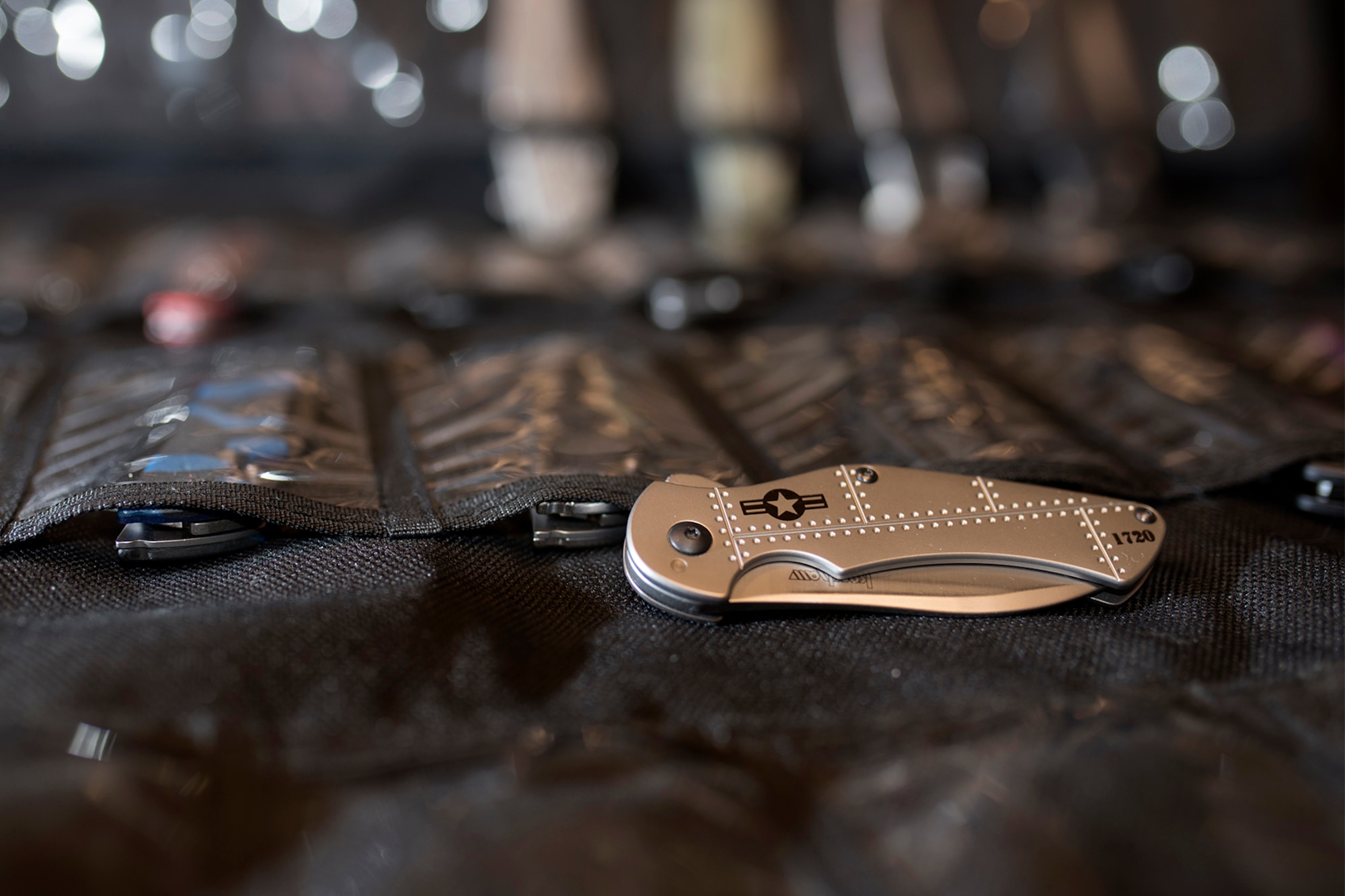 PETERSON AIR FORCE BASE, Colo. – Staff Sgt. Michael Craddock, 21st Space Wing operational security coordinator, has a collection of knives and swords numbering more than 350 pieces. His collection includes traditional folding blades, exotic fixed-blade models and several unusual blades from multiple countries. (U.S. Air Force photo by Airman 1st Class Dennis Hoffman)