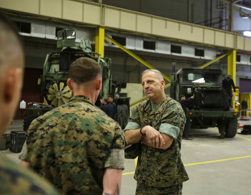 Lieutenant Gen. Michael Dana speaks with a Marine about his role in his unit during a visit to Camp Lejeune, N.C., March 13, 2017. Dana spoke to the Marines about training, logistics support requirements, innovation and new technology. Dana is the Deputy Commandant of Installation and Logistics.  (U.S. Marine Corps photo by Cpl. Ashley Lawson) 