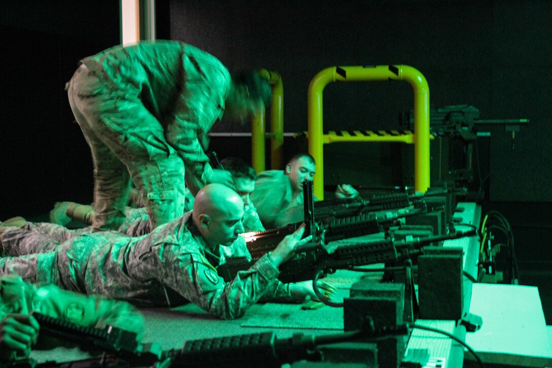 U.S. Army Reserve Sgt. 1st Class Wesley Beck, 560th Movement Control Team, 79th Sustainment Support Command, practices gunnery validation tables on the engagement skills trainer during Operation Cold Steel at Fort McCoy, Wis., March 12, 2017. Operation Cold Steel is the U.S. Army Reserve's crew-served weapons qualification and validation exercise to ensure that America's Army Reserve units and soldiers are trained and ready to deploy on short-notice and bring combat-ready and lethal firepower in support of the Army and our joint partners anywhere in the world. (U.S. Army Reserve photo by Staff Sgt. Debralee Best, 84th Training Command)