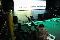 U.S. Army Reserve Pfc. Patrick Robinson, 244th Expeditionary Combat Aviation Brigade, Army Reserve Aviation Command practices gunnery validation tables on the engagement skills trainer during Operation Cold Steel at Fort McCoy, Wis., March 12, 2017. Operation Cold Steel is the U.S. Army Reserve's crew-served weapons qualification and validation exercise to ensure that America's Army Reserve units and soldiers are trained and ready to deploy on short-notice and bring combat-ready and lethal firepower in support of the Army and our joint partners anywhere in the world. (U.S. Army Reserve photo by Staff Sgt. Debralee Best, 84th Training Command)