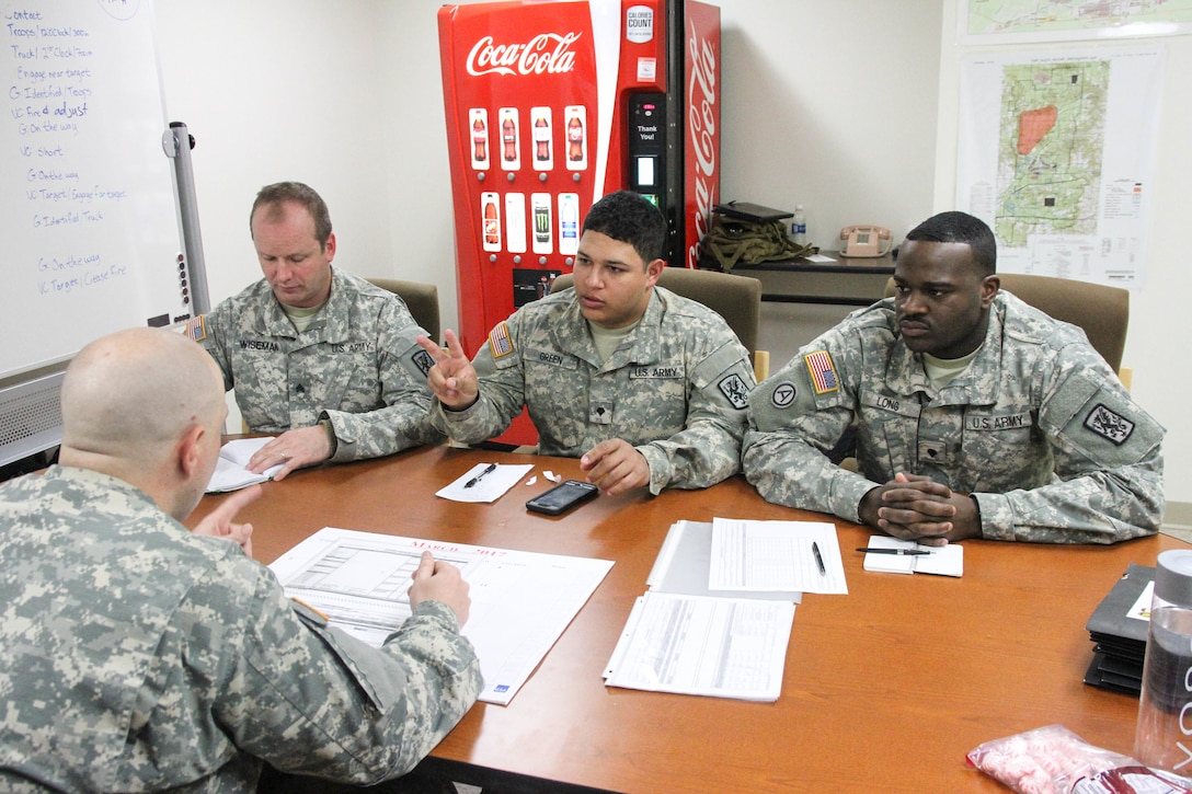 U.S. Army Reserve Soldiers with the 371st Chemical, Biological, Radiological and Nuclear Company, conduct an after action review after completing a gunnery validation table in the Reconfigurable Vehicle Tactical Trainer during Operation Cold Steel at Fort McCoy, Wis., March 12, 2017. Operation Cold Steel is the U.S. Army Reserve's crew-served weapons qualification and validation exercise to ensure that America's Army Reserve units and soldiers are trained and ready to deploy on short-notice and bring combat-ready and lethal firepower in support of the Army and our joint partners anywhere in the world. (U.S. Army Reserve photo by Staff Sgt. Debralee Best, 84th Training Command)