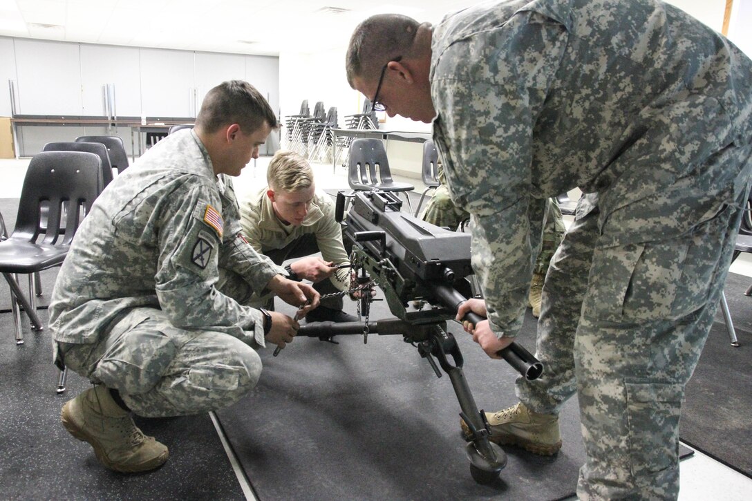 U.S. Army Reserve Soldiers with 419th Transportation Company, 79th Sustainment Support Command, mount an MK-19 automatic grenade launcher during preliminary marksmanship instruction during Operation Cold Steel at Fort McCoy, Wis., March 12, 2017. Operation Cold Steel is the U.S. Army Reserve's crew-served weapons qualification and validation exercise to ensure that America's Army Reserve units and soldiers are trained and ready to deploy on short-notice and bring combat-ready and lethal firepower in support of the Army and our joint partners anywhere in the world. (U.S. Army Reserve photo by Staff Sgt. Debralee Best, 84th Training Command)