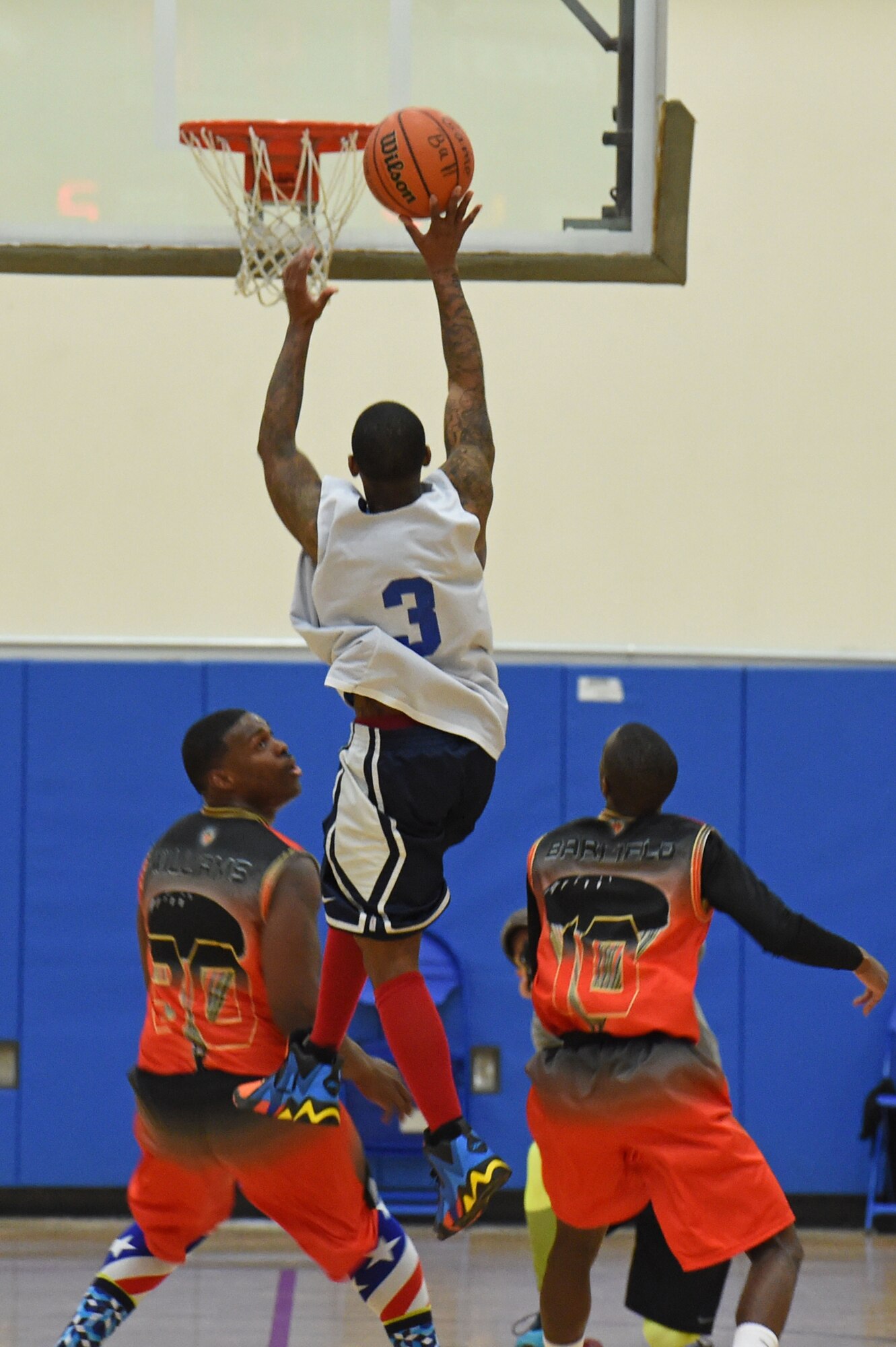 Patrick Hernandez goes for the shot during the intramural basketball championship at the Joint Base Elmendorf-Richardson Buckner Physical Fitness Center, Alaska, March 11, 2017. Hernandez is part of the team of Soldiers from Alpha Company, 6th Brigade Engineer Battalion, 4th Infantry Brigade Combat Team (Airborne), 25th Infantry Division, which took first place against the Soldiers from the 2nd Battalion, 377th Parachute Field Artillery Regiment, 4/25th IBCT (A). 