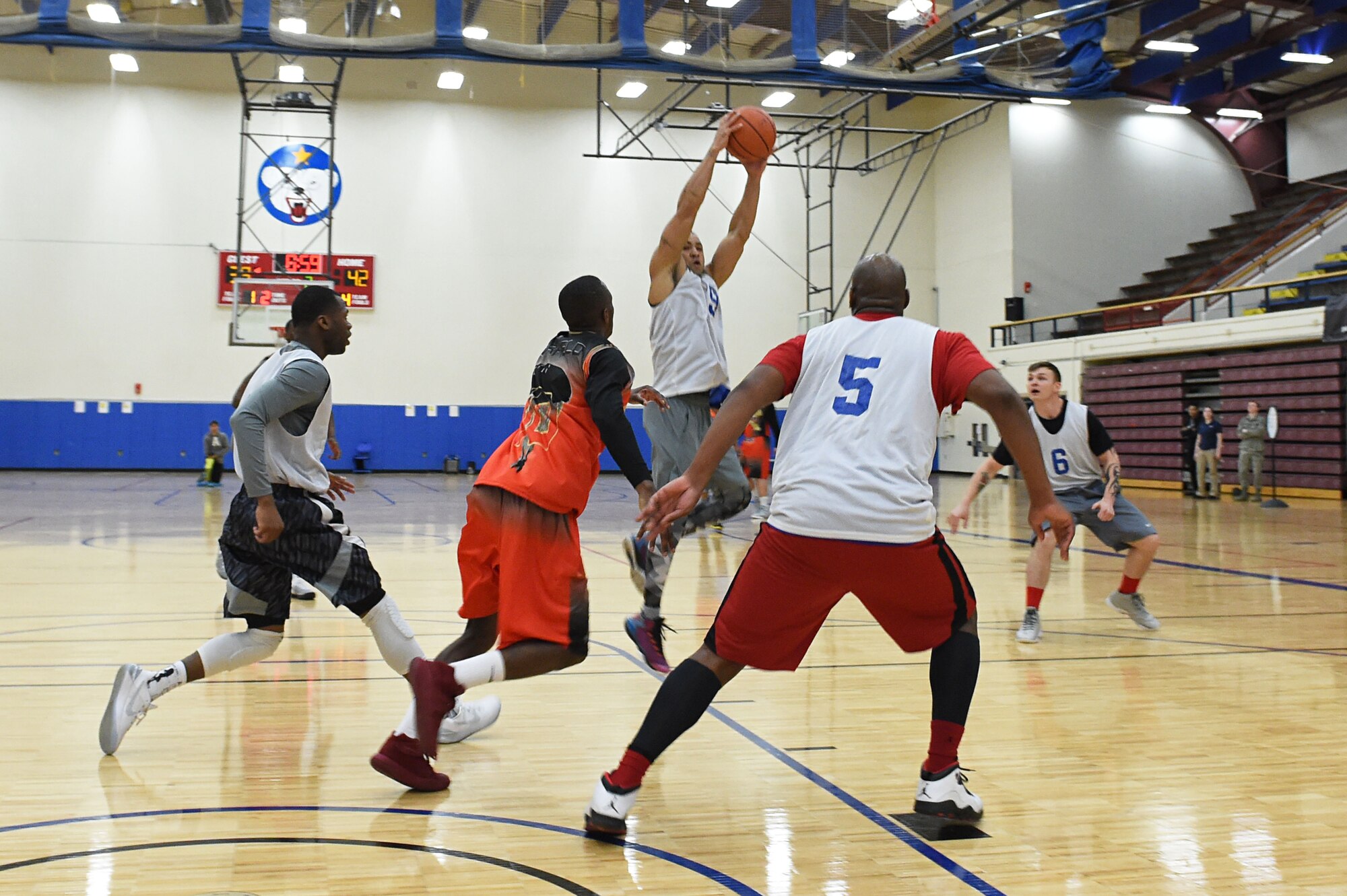 Soldiers compete in the intramural basketball championship at the Joint Base Elmendorf-Richardson Buckner Physical Fitness Center, Alaska, March 11, 2017. Soldiers from Alpha Company, 6th Brigade Engineer Battalion, 4th Infantry Brigade Combat Team (Airborne), 25th Infantry Division, took first place against Soldiers from the 2nd Battalion, 377th Parachute Field Artillery Regiment, 4/25th IBCT (A). 