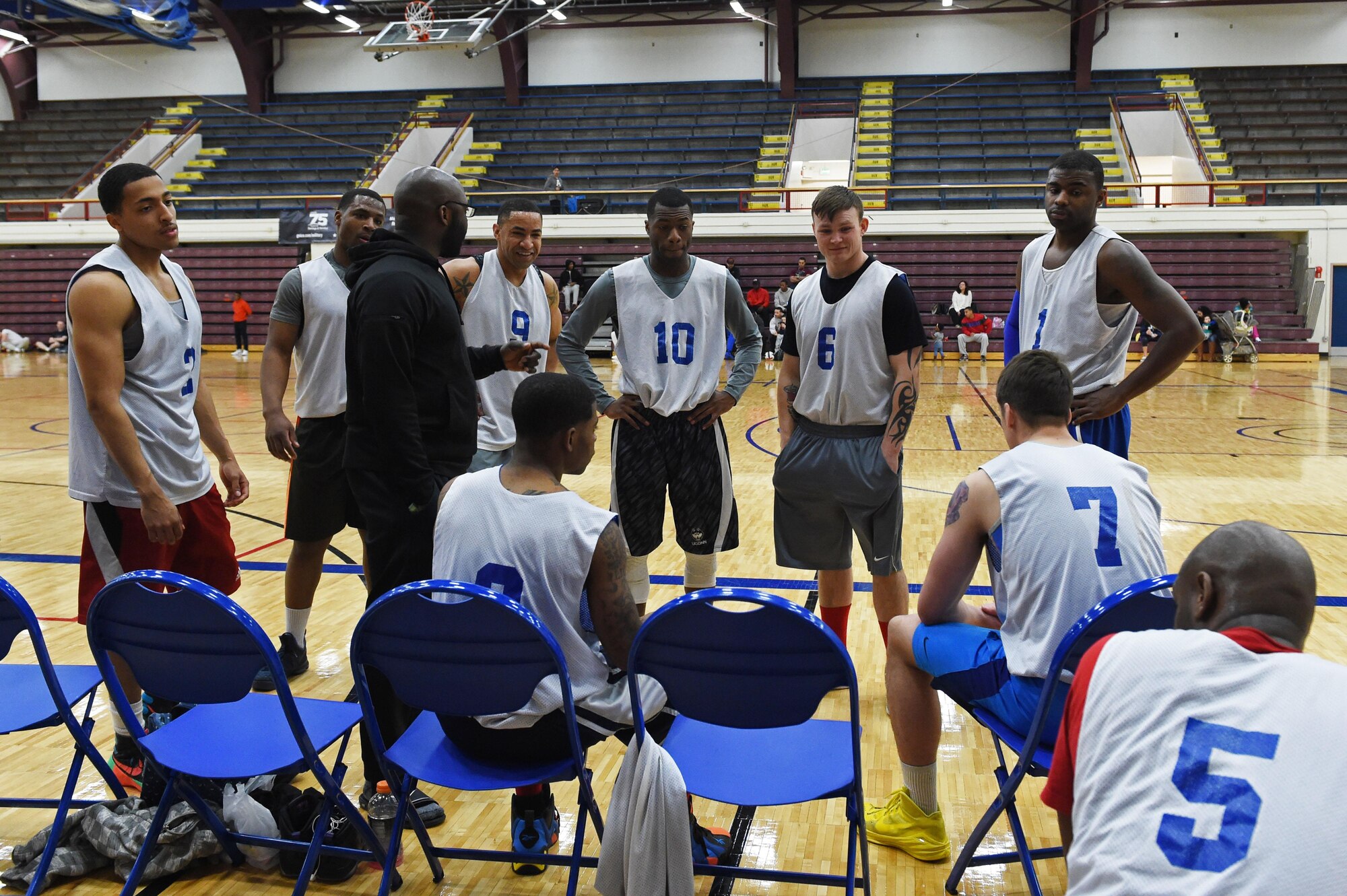 Soldiers listen to their coach during the intramural basketball championship at the Joint Base Elmendorf-Richardson Buckner Physical Fitness Center, Alaska, March 11, 2017. Soldiers from Alpha Company, 6th Brigade Engineer Battalion, 4th Infantry Brigade Combat Team (Airborne), 25th Infantry Division, took first place against Soldiers from the 2nd Battalion, 377th Parachute Field Artillery Regiment, 4/25th IBCT (A). 