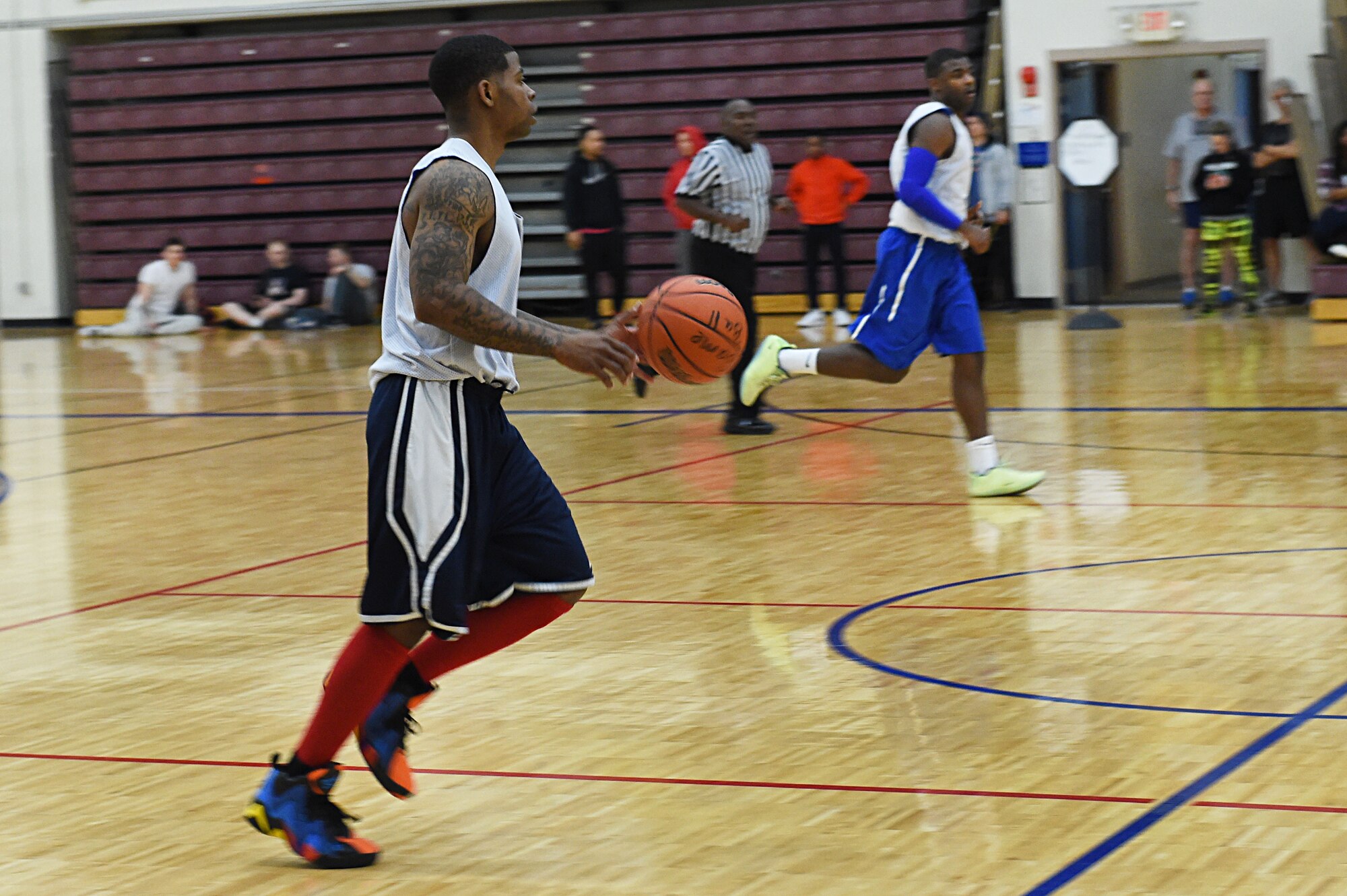 Patrick Hernandez makes his way across the court during the intramural basketball championship at the Joint Base Elmendorf-Richardson Buckner Physical Fitness Center, Alaska, March 11, 2017. Soldiers from Alpha Company, 6th Brigade Engineer Battalion, 4th Infantry Brigade Combat Team (Airborne), 25th Infantry Division, took first place against Soldiers from the 2nd Battalion, 377th Parachute Field Artillery Regiment, 4/25th IBCT (A). 