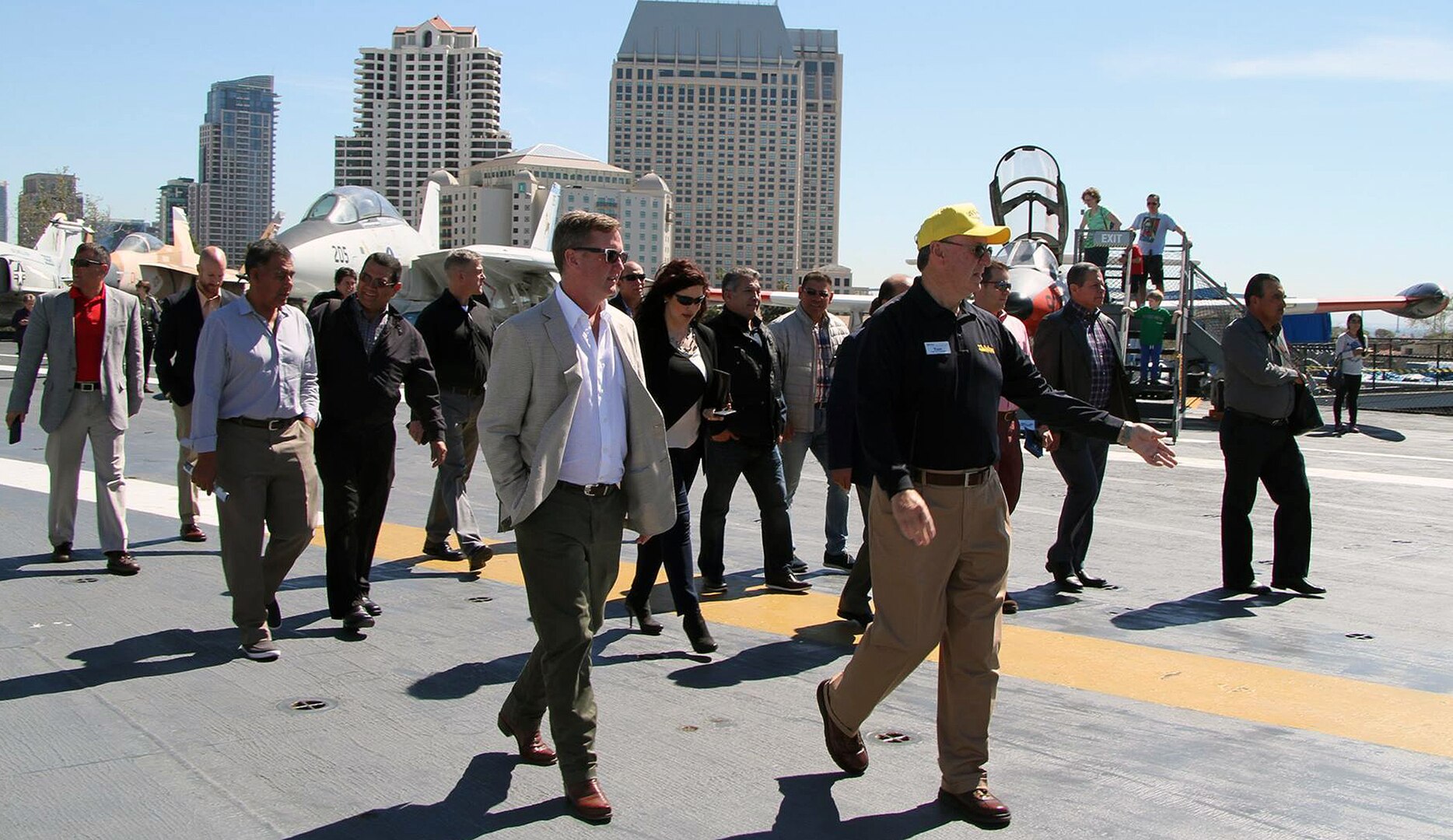 Leaders from U.S. Army North (Fifth Army) and Mexico's Secretaría de la Defensa Nacional walk across the deck of the U.S.S. Midway in San Diego March 7. The two organizations, along with other U.S. government agencies, gathered for a three-day regional border commander’s conference to strengthen the partnership between the two countries.