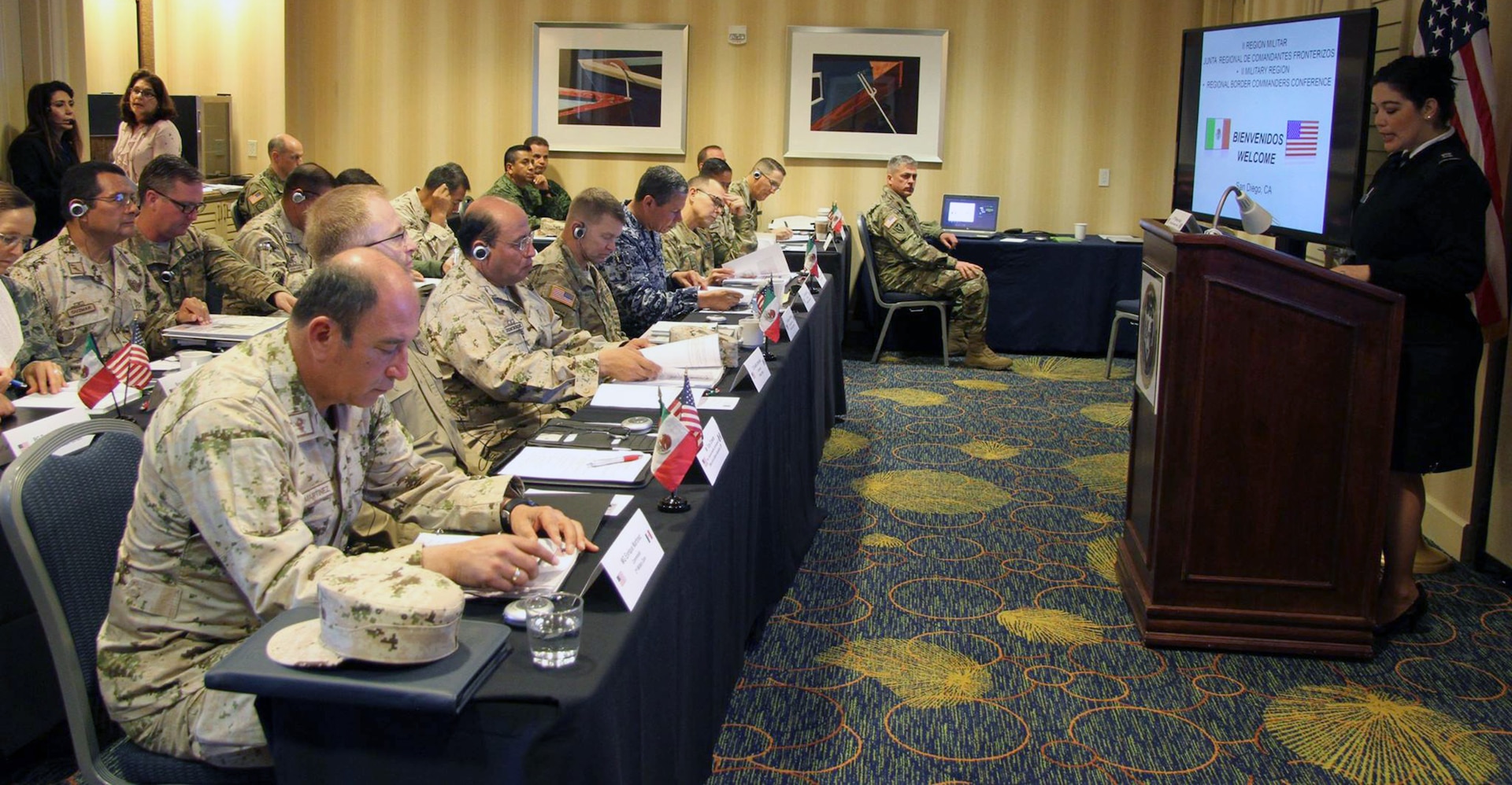 U.S. Army North (Fifth Army) and Secretería de la Defensa Nacional officials listen at the onset of the quarterly regional border commanders conference in San Diego March 8. The meeting brings commanders together to discuss common issues along their border and strengthen their partnership.
