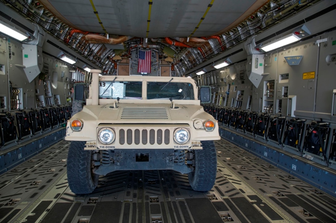 A Marine Corps High Mobility Multipurpose Wheeled Vehicle (HMMWV) is parked in the loading bay of an Air Force C-17 Globemaster III aircraft during Strategic Mobility Exercise on March Air Force Reserve Base, Calif., March 12, 2017. STRATMOBEX is a training exercise conducted by the 1st Marine Logistics Group in order to maintain readiness and sharpen skills needed to rapidly deploy personnel and equipment on a large scale.
