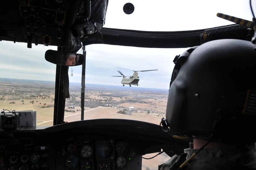Aircrews from the 11th Expeditionary Combat Aviation Brigade (ECAB) flew three CH-47 Chinooks helicopters, specially outfitted with Bambi Bucket equipment, to assist in the relief efforts of those who were affected by the wildfires, Mar. 9. The 11th ECAB is a subordinate unit under the Army Reserve Aviation Command (ARAC). The Army Reserve Aviation Command’s mission is to provide mission command to all assigned units in order to deploy trained and ready Expeditionary Combat Aviation Brigades and Theater Fixed Wing Battalions to a specified area of operations in support of the combatant commander. Its capabilities include air assault, air movement, aeromedical evacuation, casualty evacuation and civil support operations. Army Reserve units have capabilities critical to DSCA response, including search and rescue, aviation, engineer, transportation, medical and communications support. The Army Reserve has Soldiers and equipment in more than 1,100 communities across the nation allowing immediate respond to local emergencies. We stand with our nation in support of our neighbors and our primary concern is their safety and well-being. (U.S. Army Photo by Capt. Matthew Roman, Army Reserve Aviation Command Public Affairs Officer)