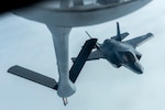 A U.S. Marine Corps F-35B Lightning II from the Marine Fighter Attack Squadron 121, approaches the boom of a KC-135 Stratotanker from the 909th Air Refueling Squadron for an inflight refuel March 14, 2017, over the Pacific Ocean. The 909th ARS provides combat-ready KC-135 tanker aircrews to support peacetime operations and all levels of conflict in the Indo-Asia-Pacific theater. 