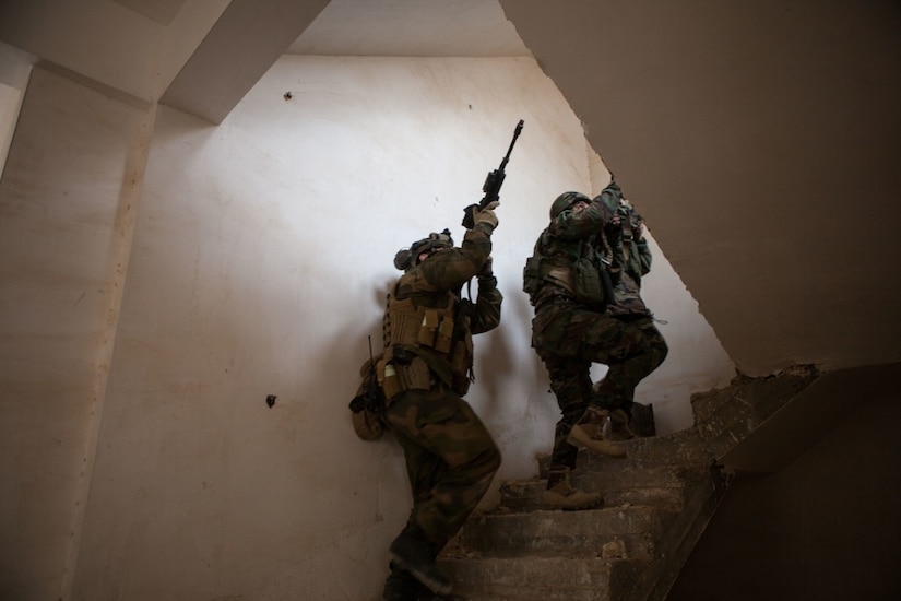 A Norwegian trainer moves through a building alongside Zeravani soldiers during training in military operations on urban terrain at Erbil, Iraq, Jan. 31, 2017. Norway is one of more than 60 coalition partners who are part of the Combined Joint Task Force-Operation Inherent Resolve building partner capacity mission dedicated to training Iraqi security forces. CJTF-OIR is the global coalition to defeat the Islamic State of Iraq and Syria. Army photo by Sgt. Josephine Carlson
