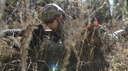 Staff Sgt. Dylan M. Churby, 628th Logistics Readiness Squadron vehicle operator, sights his weapon from the prone position during a field training exercise at McCrady Army National Guard Training Center, Eastover, South Carolina March 9, 2017. Churby secured a linear danger area during the exercise which required a group of Airmen to navigate to a specific destination and deliver recently learned combat medical care to a simulated casualty. Thirty Airmen from Joint Base Charleston attended the weeklong war skills training that taught land navigation, combat casualty care, improvised explosive device identification procedures, hand-to-hand combat skills and team building exercises.