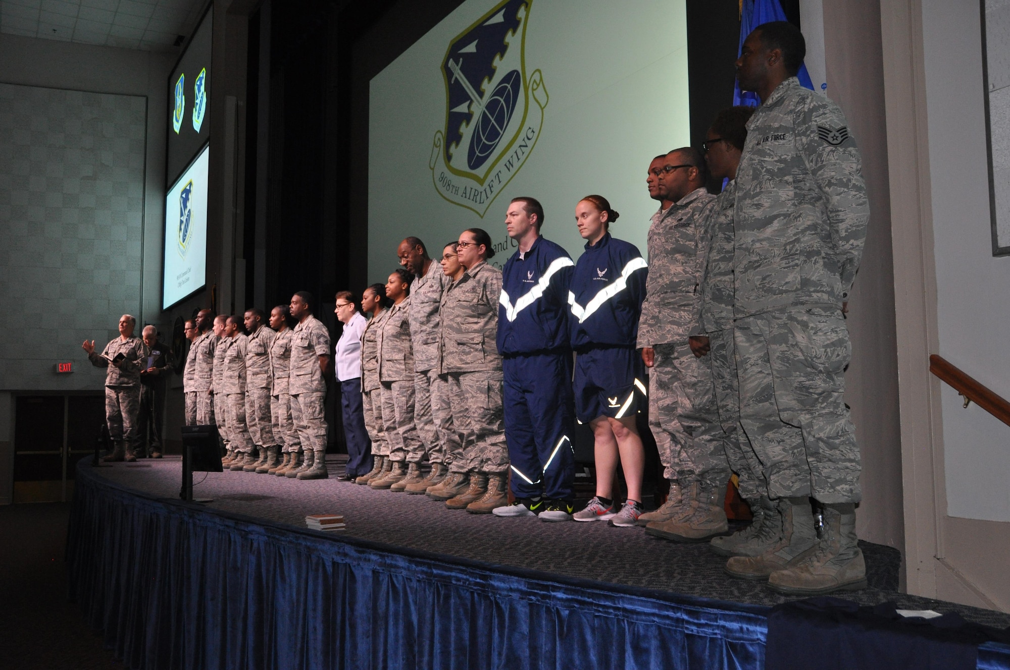 The 908th Airlift Wing’s vice commander, Col. Pat Brooks recognizes key members of the wing that helped get through a successful Unit Effectiveness Inspection during an Enlisted Call March 5 at Maxwell Air Force Base. Command Chief Master Sgt. Tina Carlson, the highest enlisted member of the wing, held the call to focus on development and recognition for the enlisted members of the 908th. (U.S. Air Force photo by Bradley J. Clark)