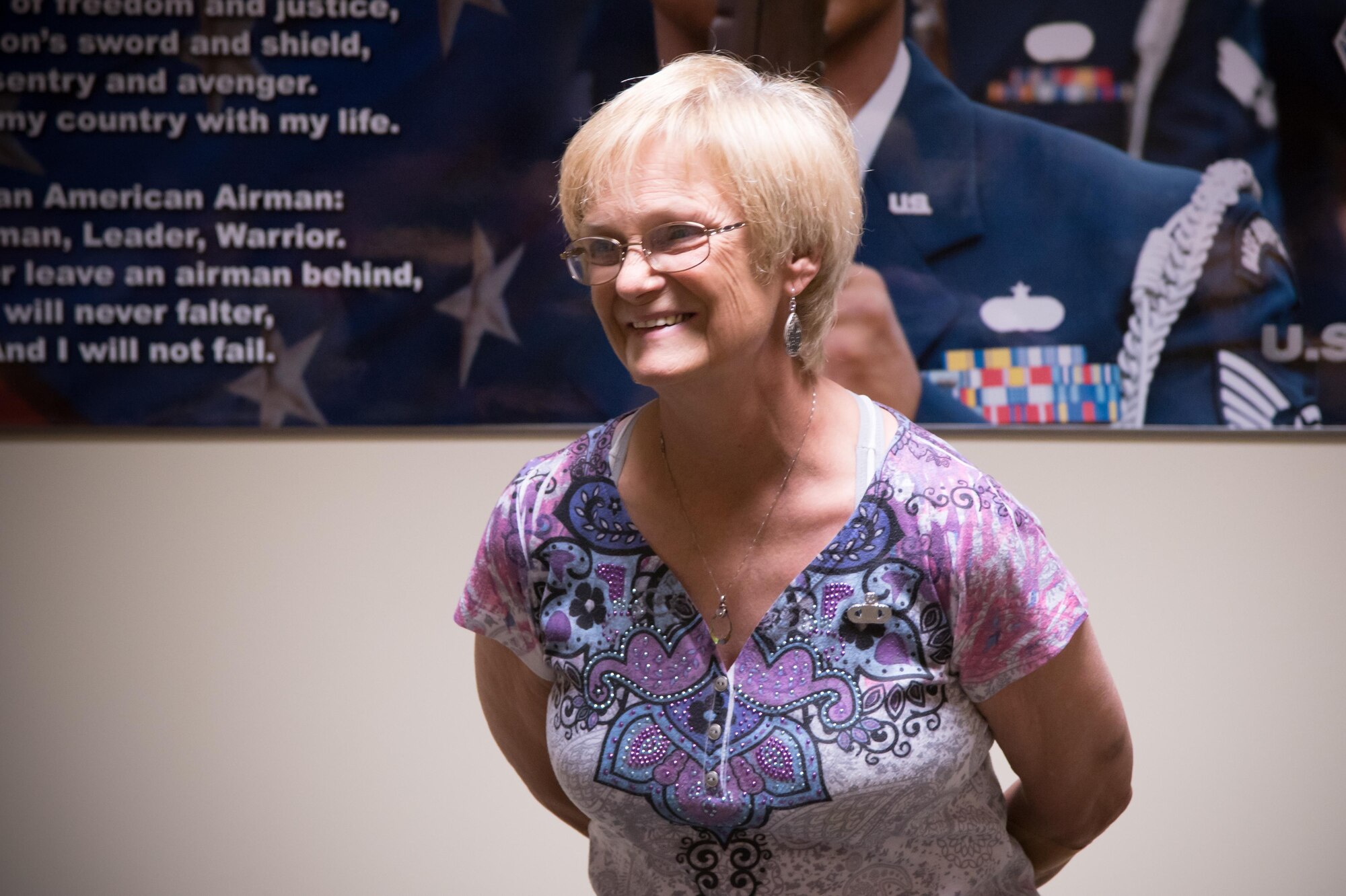 Libby Harper, 81st 81st Operations Support Flight host aviation resource management chief, along with friends, family and coworkers celebrates her retirement during a hertiage ceremony March 3 at Keesler Air Force Base, Mississippi. (U.S. Air Force photo/Staff Sgt. Heather Heiney)