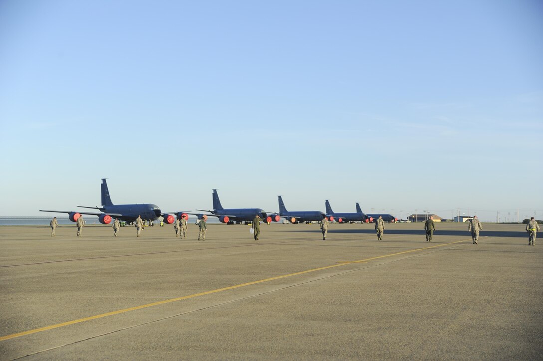 Members of the 940th Air Refueling Wing look for foreign object debris on the KC-135 area of the flightline March 12, 2017, at Beale Air Force Base, California. A FOD walk is performed because even the smallest debris can cause damage to aircraft and endanger the Airmen. (U.S. Air Force photo by Senior Airman Tara R. Abrahams)