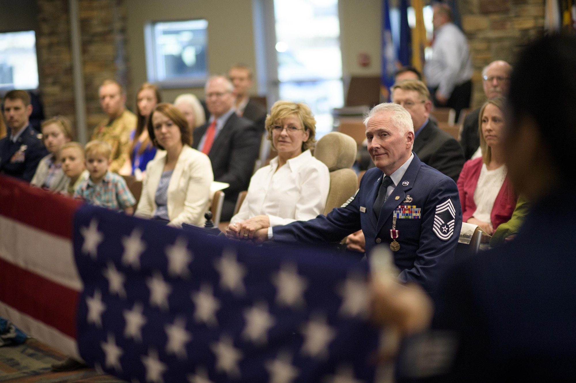 The retirement flag is folded for Chief Master Sgt. Tom Kimball Feb. 17, 2017 at Buckley Air Force Base, Co. The formal flag folding is a, Air Force tradition. (U.S. Air Force Photo/Tech. Sgt. David Salanitri)