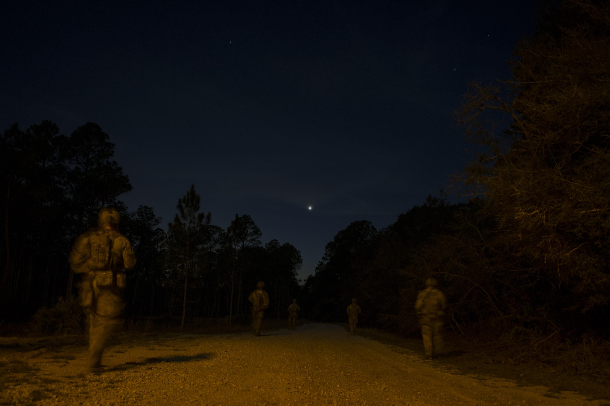 Explosive ordinance disposal Air Commandos with the 1st Special Operations Civil Engineer Squadron conduct explosive ordnance cache training at Eglin Range, Fla., March 9, 2017. During the training, EOD Airmen cleared more than a mile of roadways and disabled simulated caches of explosive ordnance. Explosive ordnance cache training is conducted quarterly to ensure EOD Air Commandos are ready to execute operations. (U.S. Air Force photo by Airman 1st Class Joseph Pick)