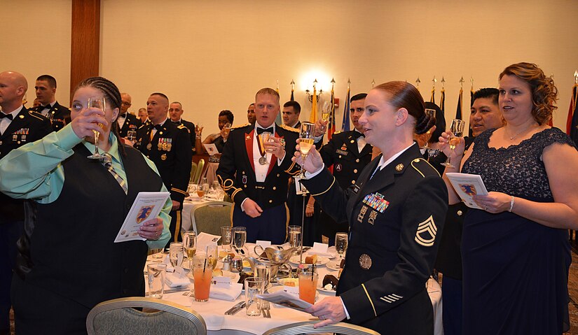 U.S. Army Soldiers assigned to the 7th Transportation Brigade (Expeditionary) conduct the ceremonial toast during the Resolute Ball in Newport News, Va., March 2, 2017. The ball is scheduled each year within a flexible window to allow as many Soldiers as possible to attend. (U.S Army photo/Staff Sgt. Miguel Bracero)