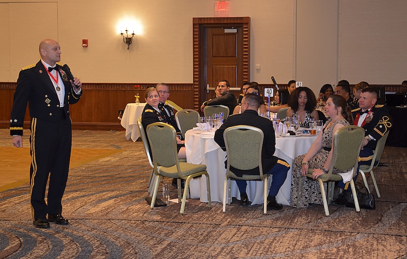 U.S. Army Maj. Gen. Anthony Funkhouser, Center for Initial Military Training commander, speaks to the Soldiers from the 7th Transportation Brigade (Expeditionary) and their guests during the Resolute Ball in Newport News, Va., March 2, 2017. Funkhouser spoke about being proud to be part of the Army team. (U.S Army photo/Staff Sgt. Miguel Bracero)