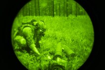Airman 1st Class Ashton Flynt, an explosive ordnance disposal journeyman with the 1st Special Operations Civil Engineer Squadron, inspects an explosive ordnance cache during training at Eglin Range, March 9, 2017. Explosive ordnance cache training is conducted quarterly by the EOD Airmen to ensure continued readiness to execute operations. (U.S. Air Force photo by Airman 1st Class Joseph Pick)