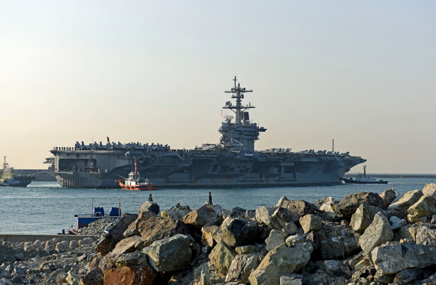 The aircraft carrier USS Carl Vinson (CVN 70) approaches the Republic of Korea (ROK) Fleet headquarters. The Carl Vinson Carrier Strike Group is on a regularly scheduled Western Pacific deployment as part of the U.S. Pacific Fleet-led initiative to extend the command and control functions of U.S. 3rd Fleet. 