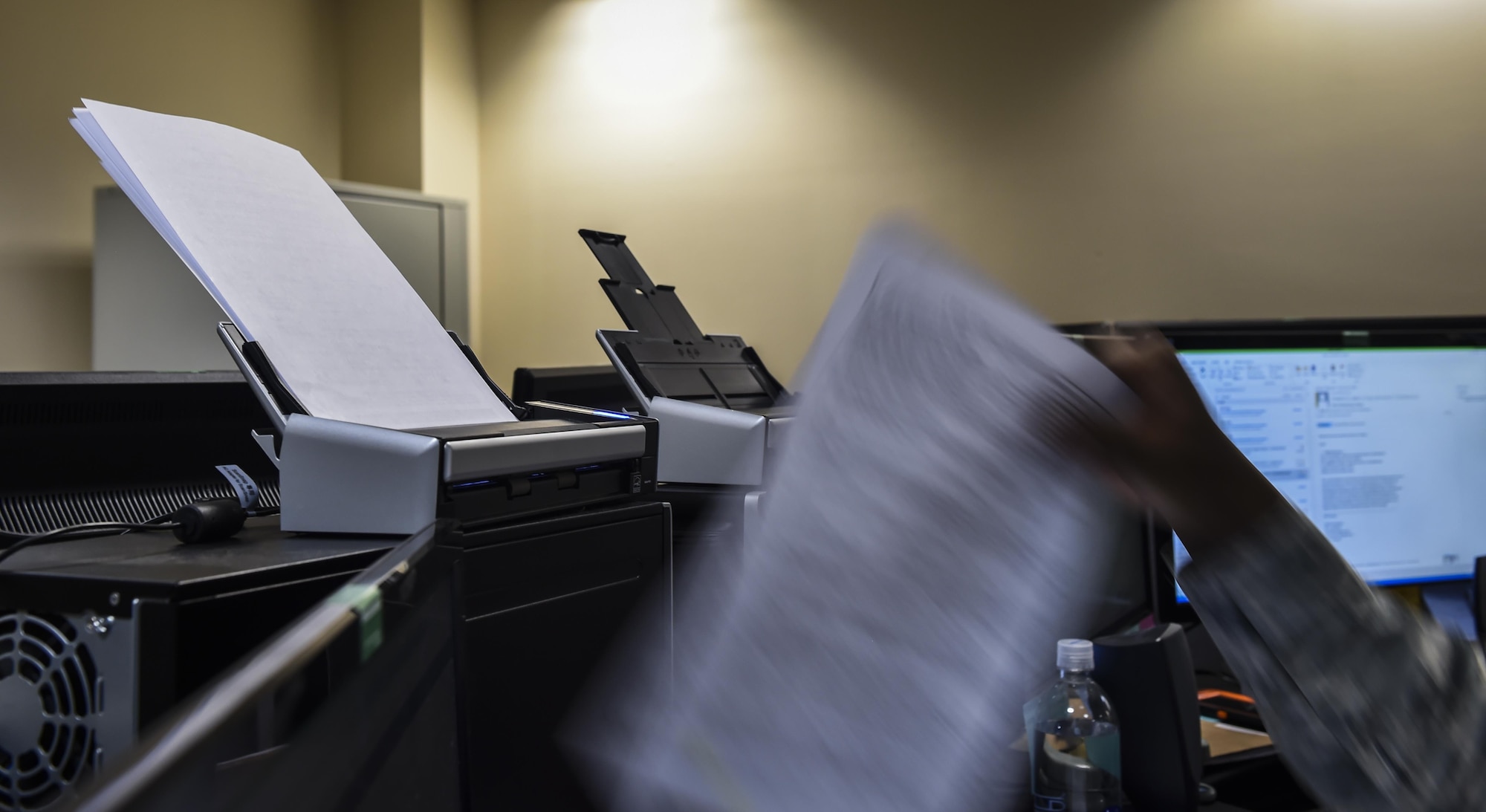 Airman 1st Class Adrian Basfield, a re-enlistment and extension technician with the 1st Special Operations Force Support Squadron, reviews re-enlistment folders for accuracy and discrepancies at the Military Personnel Flight on Hurlburt Field, Fla., March 14, 2017. Personnelists with the 1st SOFSS are broken into five sections: assignments, force management, promotions, re-enlistment and extensions, and retirement and separations. (U.S. Air Force photo by Airman 1st Class Joseph Pick)
